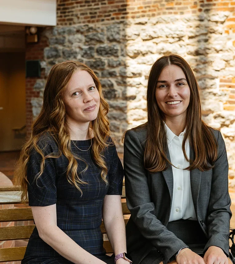 Shyanne Riddle and Savannah Edmonds posing together for a professional portrait